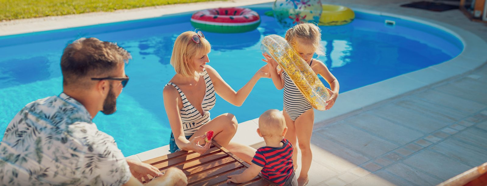 Family enjoying a clean pool during a season of relaxation